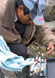 Santiago prepares water sample kit